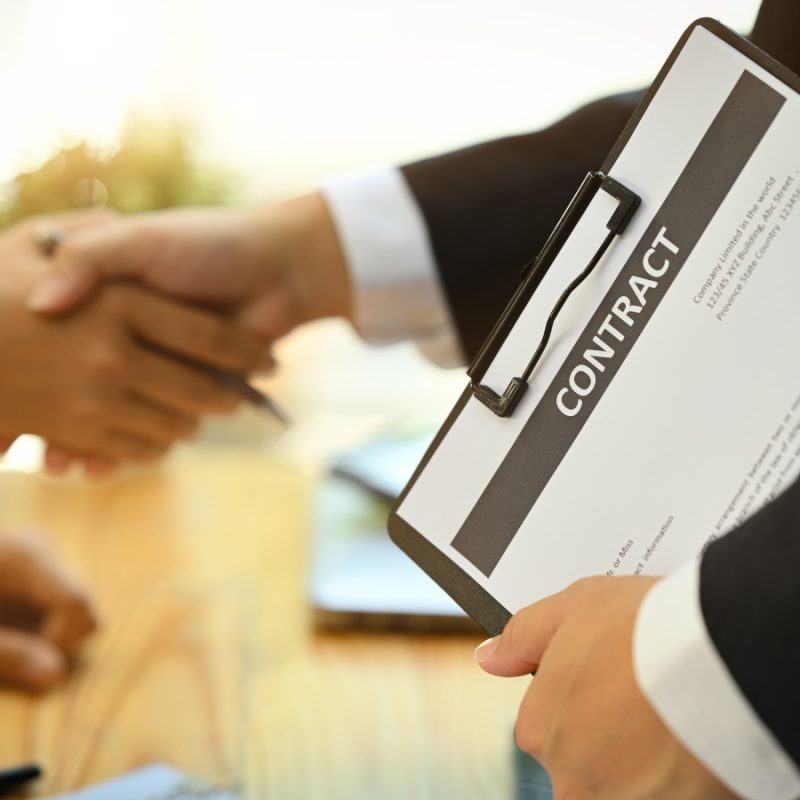 real-estate-broker-holding-contract-clipboard-whil-2024-12-05-07-58-55-utc-aaaa